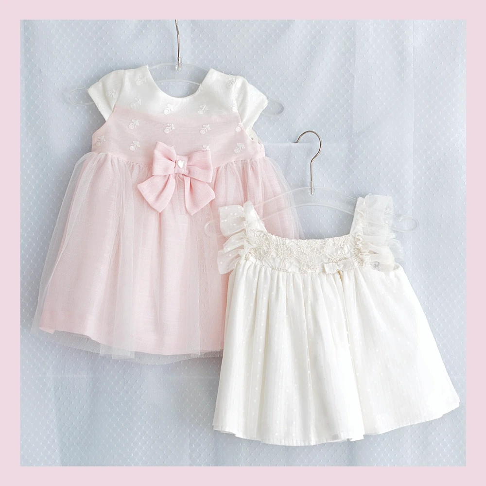 Festliche Kinderkleider in Rosa und Weiss